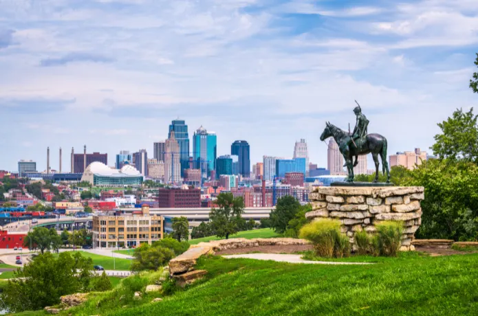 Man on Horseback in Front of a Modern City Skyline