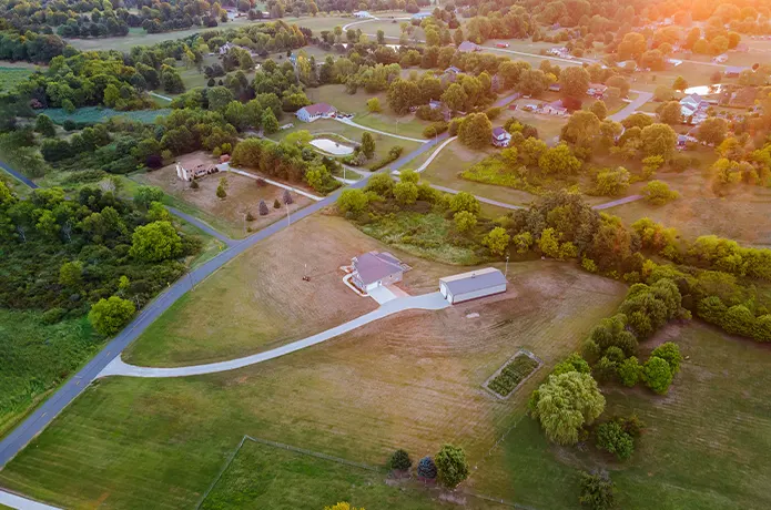 Aerial View of House and Road in Residential Community